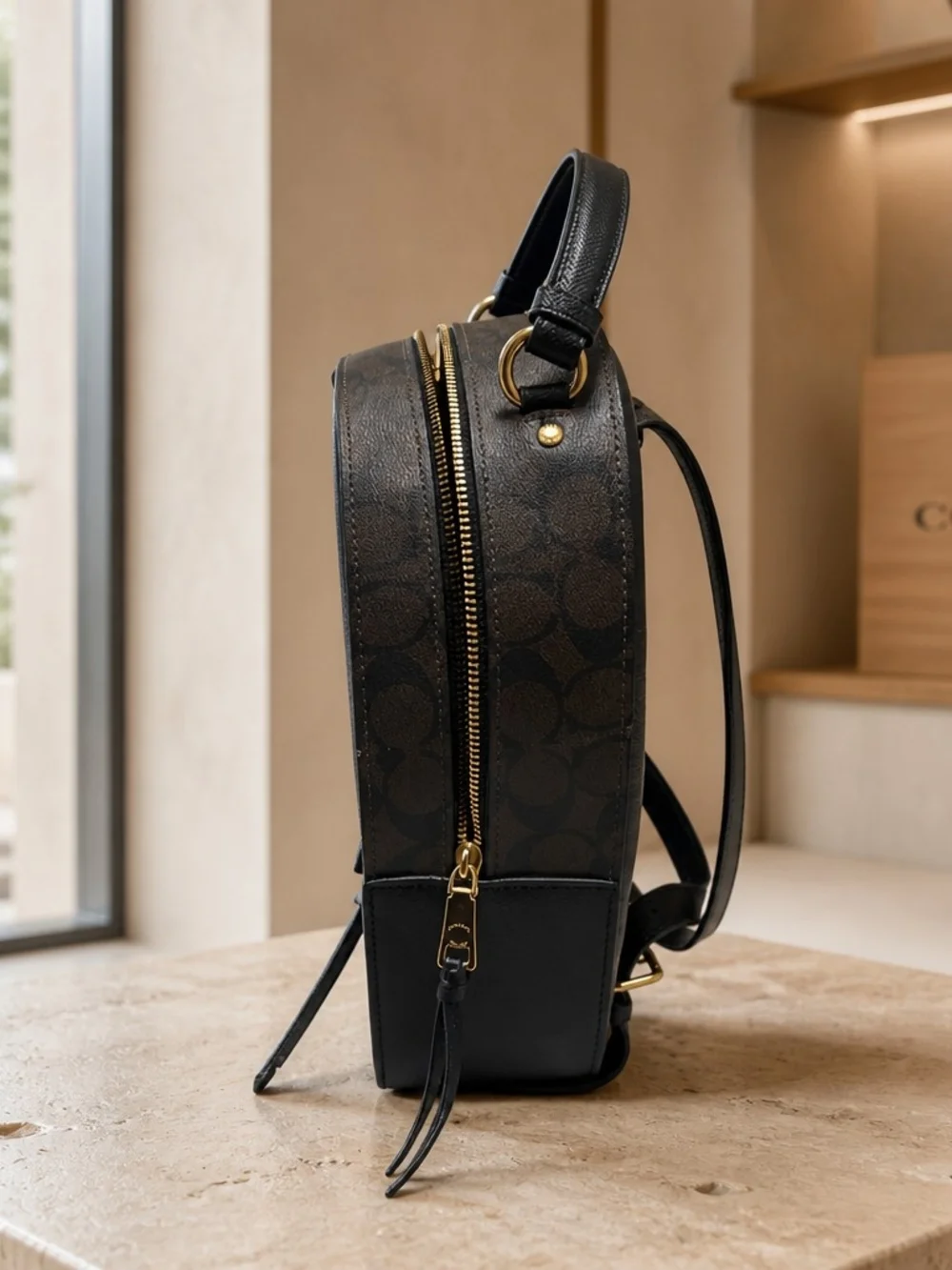 Coach Black Staffiano Leather Mini Backpack with Gold Hardware Accents